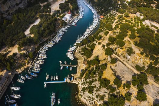 White yachts in Calanque de Port Miou, one of biggest fjords between Marseille and Cassis, France.