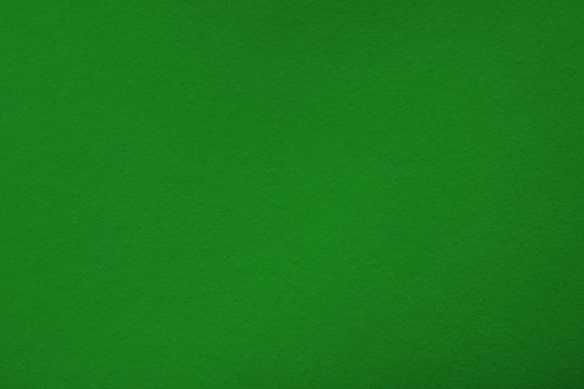 Green background with paper texture, horizontal, blank space.