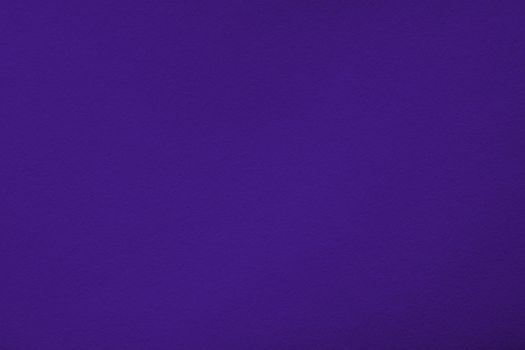 Purple background with paper texture, horizontal, blank space.