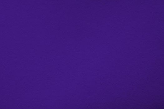 Purple background with paper texture, horizontal, blank space.