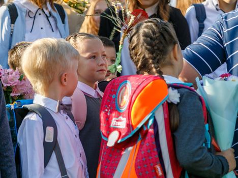 A first grader cries at the ruler on September 1 at school. First of September. School. First grade. Moscow, Russia, September 2, 2019