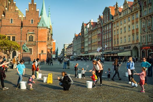 WROCLAW, POLAND-April 8, 2019: View of the Market Square in the Old Town of Wroclaw. Wroclaw is the historical capital of Lower Silesia.