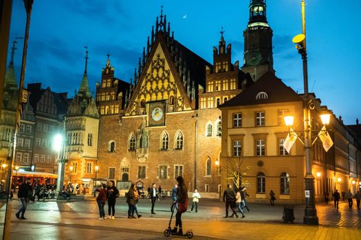 WROCLAW, POLAND-April 8, 2019:Night view of the Wroclaw Market Square with the town Hall.Europe.