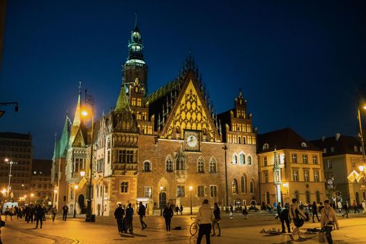 WROCLAW, POLAND-April 8, 2019:Night view of the Wroclaw Market Square with the town Hall.Europe.