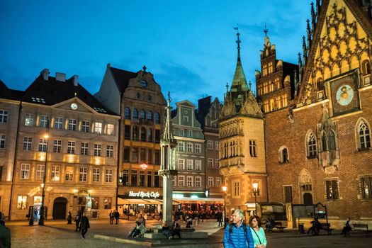 WROCLAW, POLAND-April 8, 2019:Night view of the Wroclaw Market Square with the town Hall.Europe.