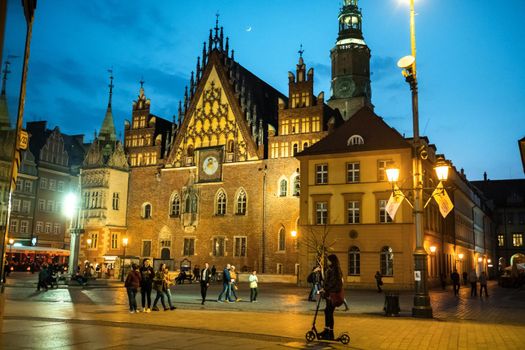 WROCLAW, POLAND-April 8, 2019:Night view of the Wroclaw Market Square with the town Hall.Europe.