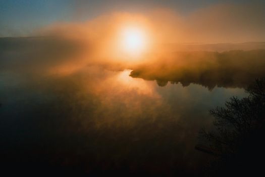 Misty dawn on the lake.Dawn in Europe on a beautiful lake.Belarus.