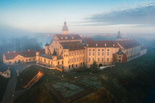 Nesvizh castle is a residential castle of the Radziwill family in Nesvizh, Belarus, with a beautiful view from above at dawn.