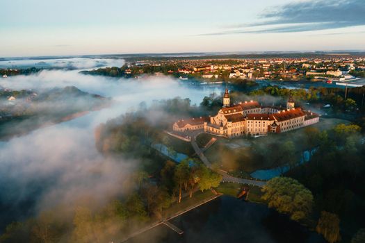 Nesvizh castle is a residential castle of the Radziwill family in Nesvizh, Belarus, with a beautiful view from above at dawn.