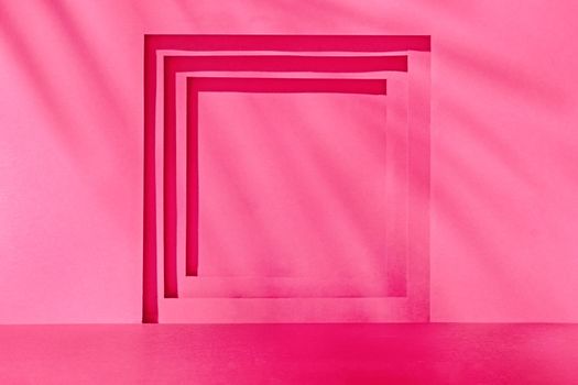 Magenta trend color geometry background in interior with frame and sunlight to show the product. High quality photo