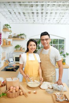 Couple cooking together at home