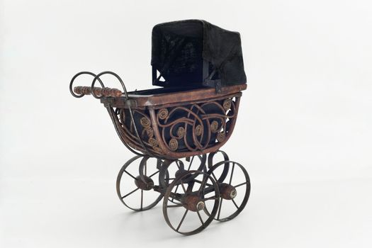 Vintage wooden stroller isolated on white background