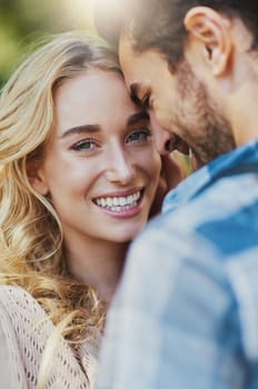 I cant imagine a life without his love. an affectionate young couple having a romantic moment outdoors