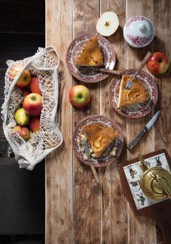 Thanksgiving Rustic wooden table setting with apple pie, home baking, High quality photo