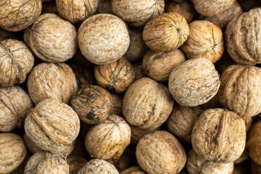 Natural walnut background texture Abstract walnuts. Harvest, agriculture