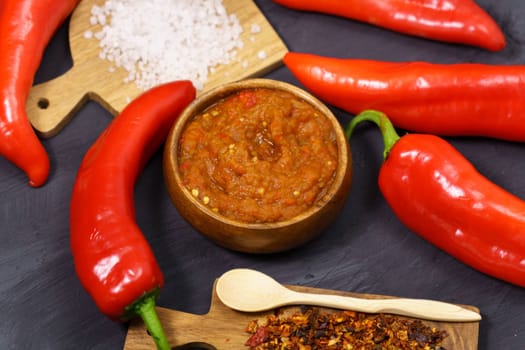 Balkan sauce ajvar and ingredients for its preparation. Serbian traditional food.