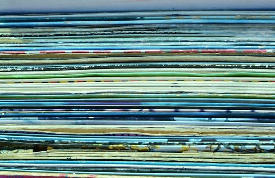 Horizontal background of old vinyl carton covers