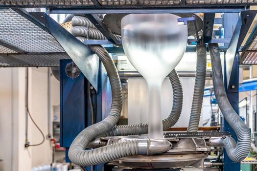blowing plastic on a machine into a roll for the production of plastic bags.