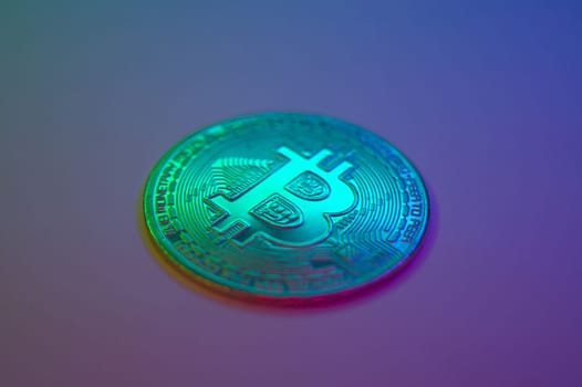 Crypto currency golden-green coin with bitcoin symbol on isolated on black background. Bitcoin Coin on colored background. Bitcoin cryptocurrency. Cryptocurrency Coin Concept. single golden valuable