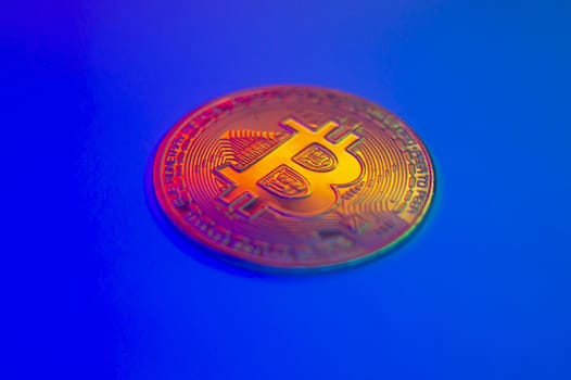 Crypto currency red coin with bitcoin symbol on isolated on black background. Bitcoin Coin on colored background. Bitcoin cryptocurrency. Cryptocurrency Coin Concept. single golden valuable