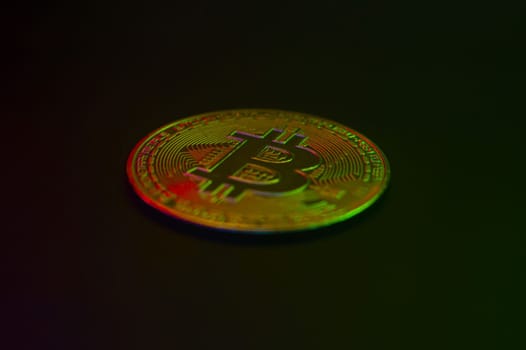 Crypto currency golden coin with bitcoin symbol on isolated on black background. Bitcoin Coin on black background. Bitcoin cryptocurrency. Cryptocurrency Coin Concept. single golden valuable
