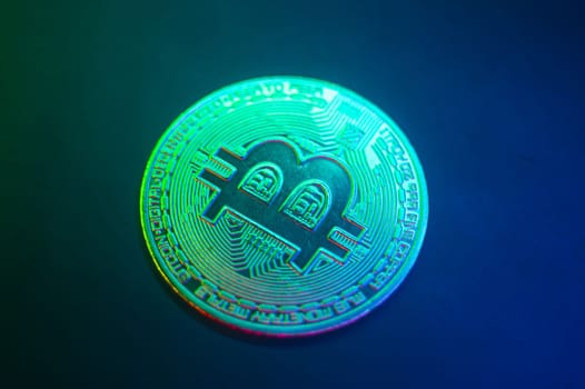 Crypto currency green-golden coin with bitcoin symbol on isolated on black background. Bitcoin Coin on black background. Bitcoin cryptocurrency. Cryptocurrency Coin Concept. single golden valuable