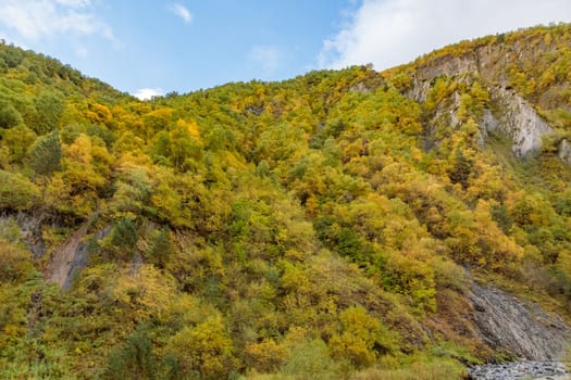 Highlands of North Ossetia. Mountains of the Caucasus. High mountains in the rays of the setting sun