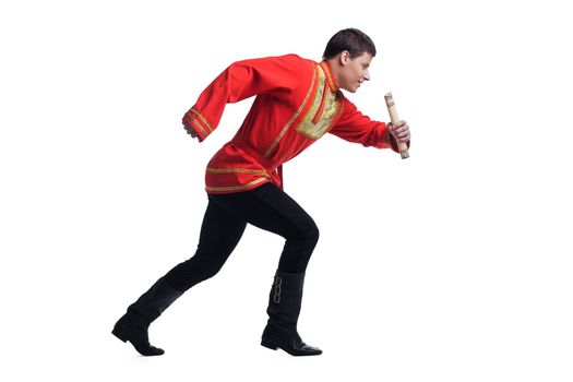 Full length portrait of dancer in russian costume. Isolated on white