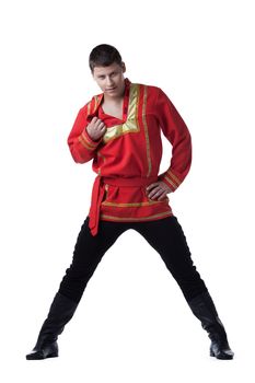 Full length portrait of sexy dancer in russian costume. Isolated on white