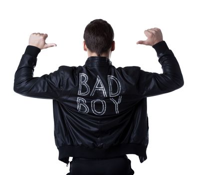 back portrait of bad boy striptease man in black jacket. Isolated on white