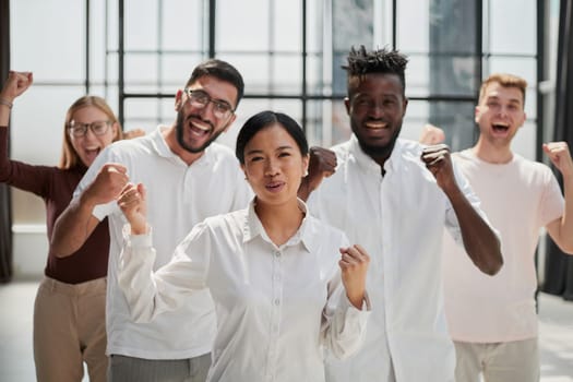 Business people looking at the camera during a business meeting in a modern office