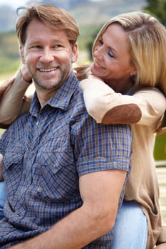 My love and my best friend. a mature married couple being affectionate outdoors