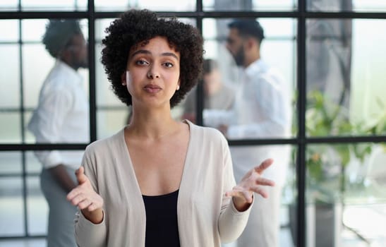 Portrait of a young business woman in an modern office