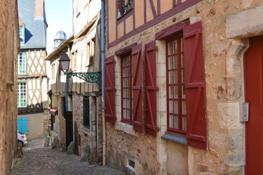Narrow streets with medieval half-timbered houses at a Le mans