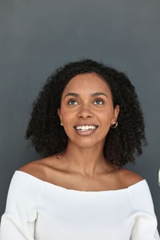 Beautiful female african american business woman CEO in a suit at the workplace