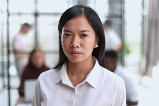 Young beautiful Asian business woman consultant working in the office,