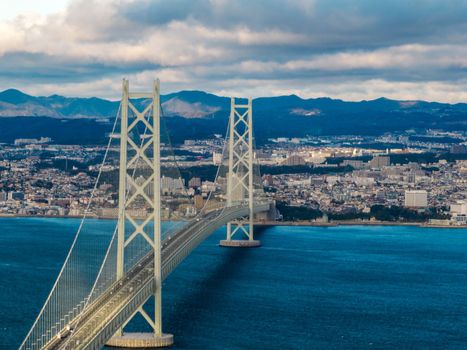 Aerial View of Light Traffic and Akashi Suspension Bridge on Cloudy Day. High quality photo