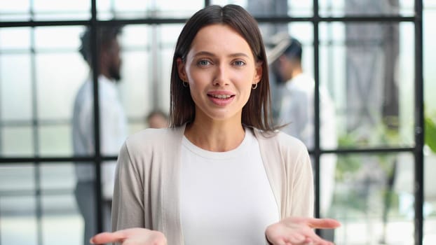 Face of beautiful woman on the background of business people