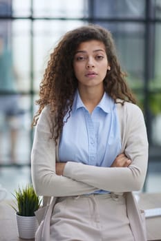girl standing at modern office looking at camera