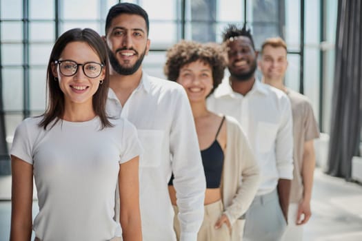 Face of beautiful woman on the background of business people