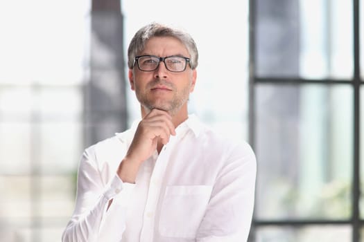 portrait of a successful business man. businessman smiling and looking at camera