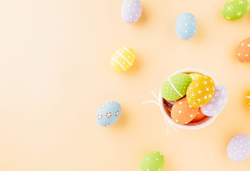 Overhead easter eggs isolated on pastel background with copy space, Funny decoration, Happy Easter Day greeting card, Creative composition banner web design holiday background, flat lay top view
