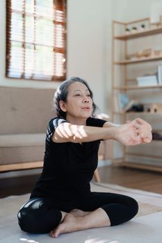 stress relief, muscle relaxation, breathing exercises, exercise, meditation, portrait of Young Asian woman relaxing her body from by practicing yoga