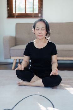 stress relief, muscle relaxation, breathing exercises, exercise, meditation, portrait of Young Asian woman relaxing her body from by practicing yoga