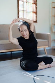 stress relief, muscle relaxation, breathing exercises, exercise, meditation, portrait of Young Asian woman relaxing her body from by practicing yoga