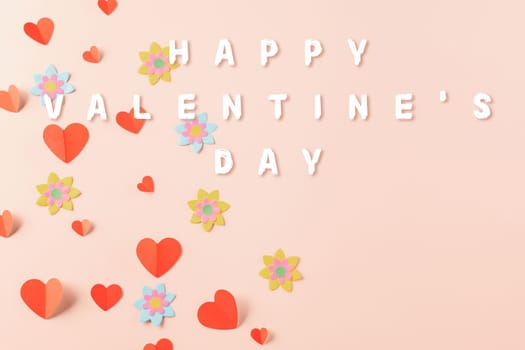 Happy Valentine's day concept. Red paper hearts cutting pastel pink background, Symbol of love paper art with copy space for text, Mother's Day