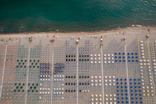 Aerial view of the equipped beach of Viareggio Tuscany photographed in the late afternoon 