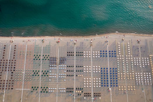 Aerial view of the equipped beach of Viareggio Tuscany photographed in the late afternoon 