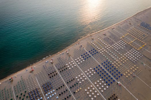 Aerial view of the equipped beach of Viareggio Tuscany photographed in the late afternoon 