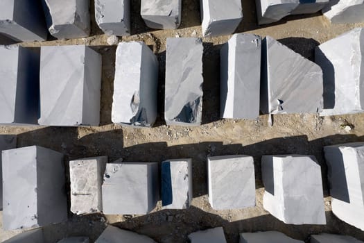 Aerial photographic documentation of a deposit of marble blocks in Carrara Italy